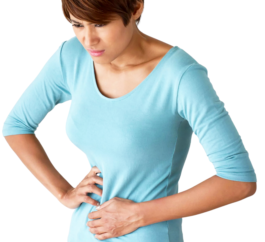 A woman in a light blue top holding her stomach in both hands